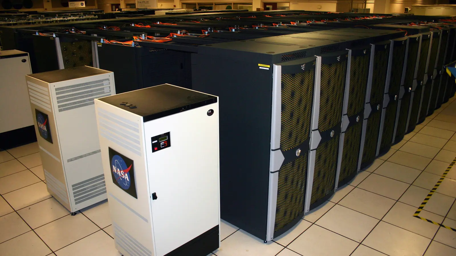Rows of cabinets in NASA’s Pleiades supercomputer facility
