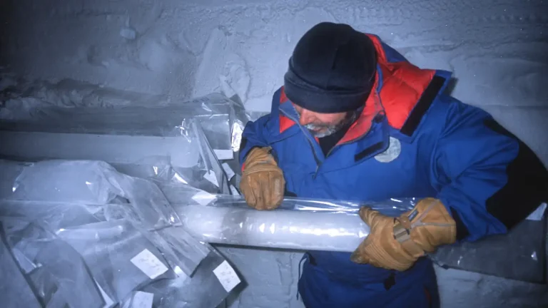 A long ice core from Talos Dome containing a visible dark volcanic ash layer
