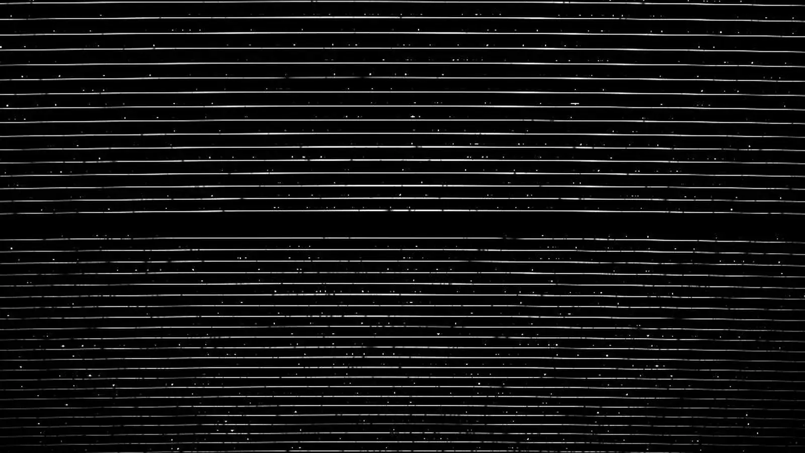 High-resolution astronomical spectrum showing many narrow absorption lines