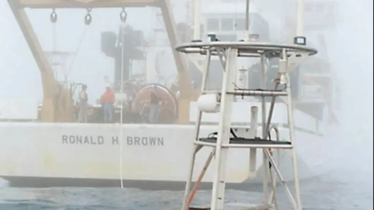 A NOAA DART tsunami-monitoring buoy floating in the ocean