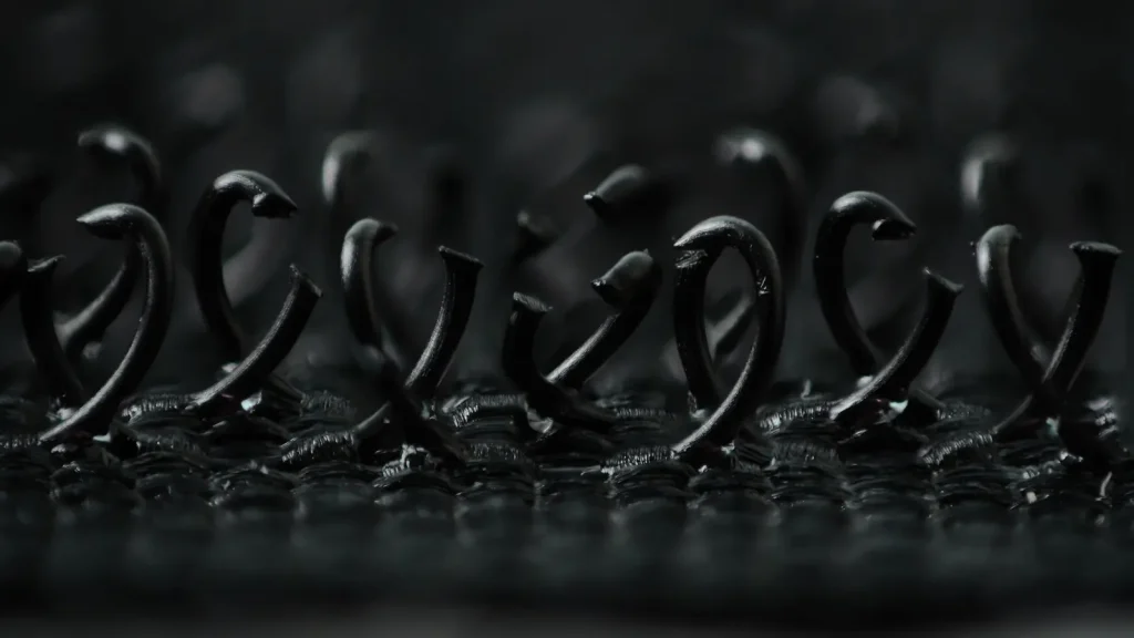 Macro photograph showing tiny hooks on hook-and-loop fastening material