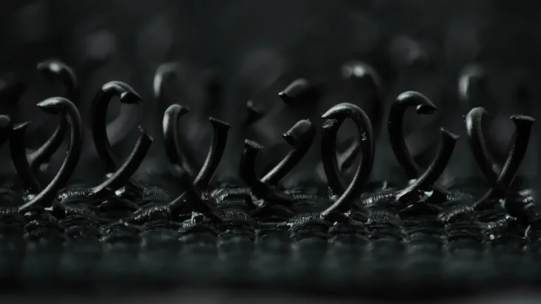 Macro photograph showing tiny hooks on hook-and-loop fastening material