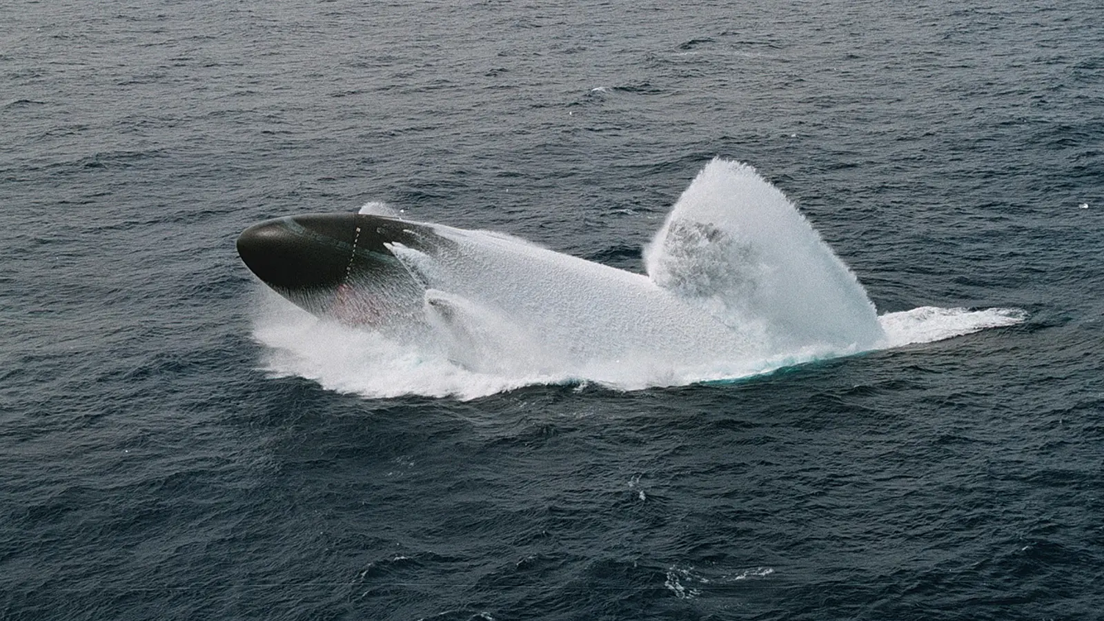 U.S. Navy submarine surfacing during an emergency drill